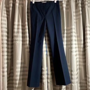 Blue trousers with cute detail on the side!